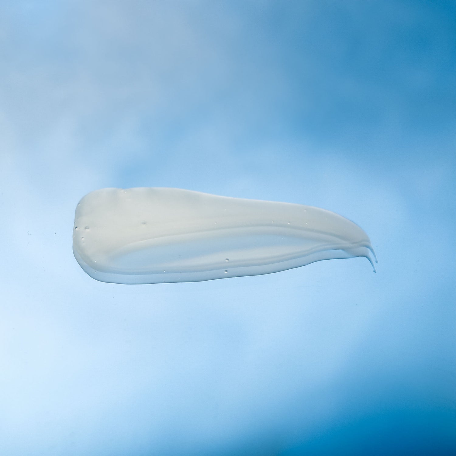 Lifestyle image of R+Co Cassette Curl Shampoo and Superseed Oil Complex