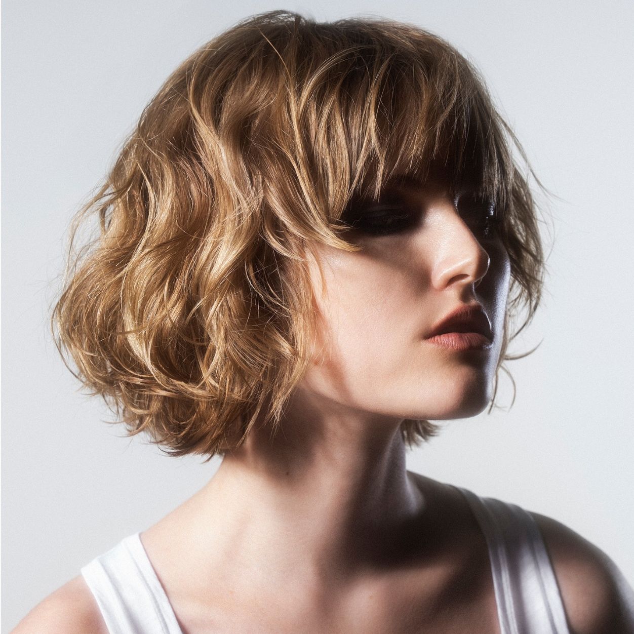 Model image of R+Co Sun Catcher Power C Nourish and Refresh Styling Spray