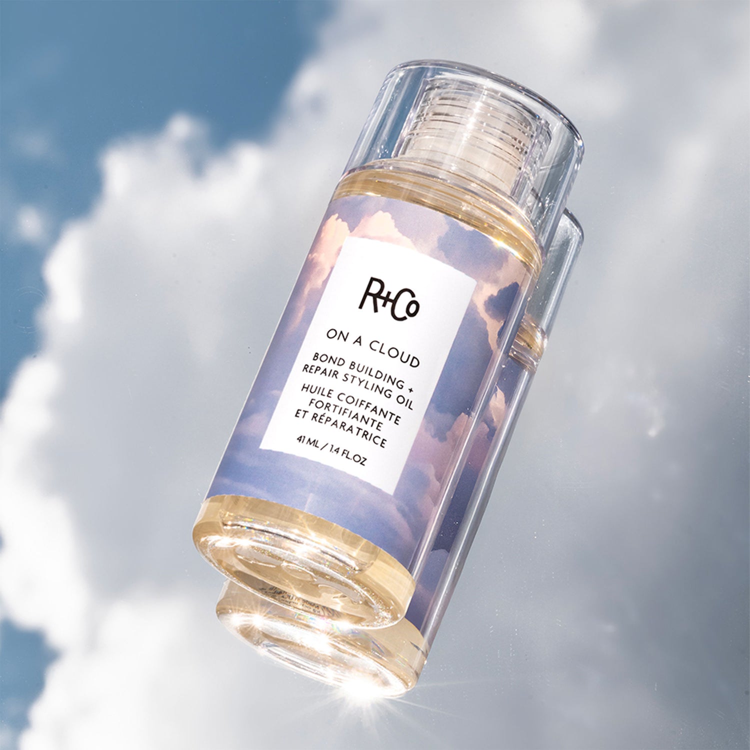 Lifestyle image of R+Co On a Cloud Bond Building Repair + Styling Oil