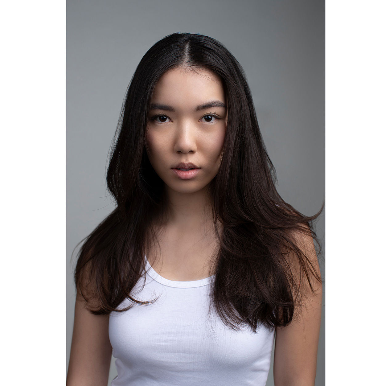 Model image of R+Co Submarine Water Activated Exfoliating Shampoo