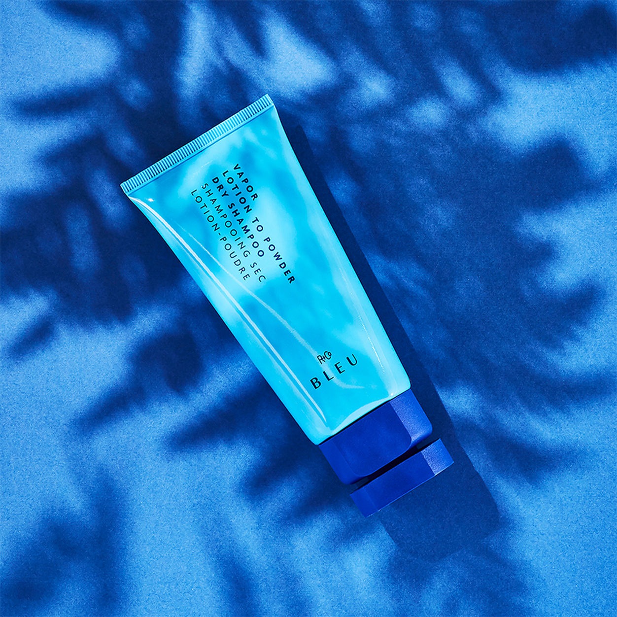Lifestyle image of R+Co Bleu Vapor Lotion To Powder Dry Shampoo