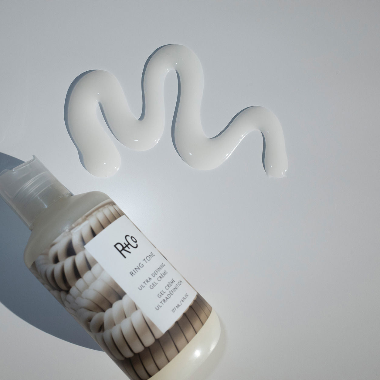 Lifestyle image of R+Co Ringtone Ultra Defining Gel Crème