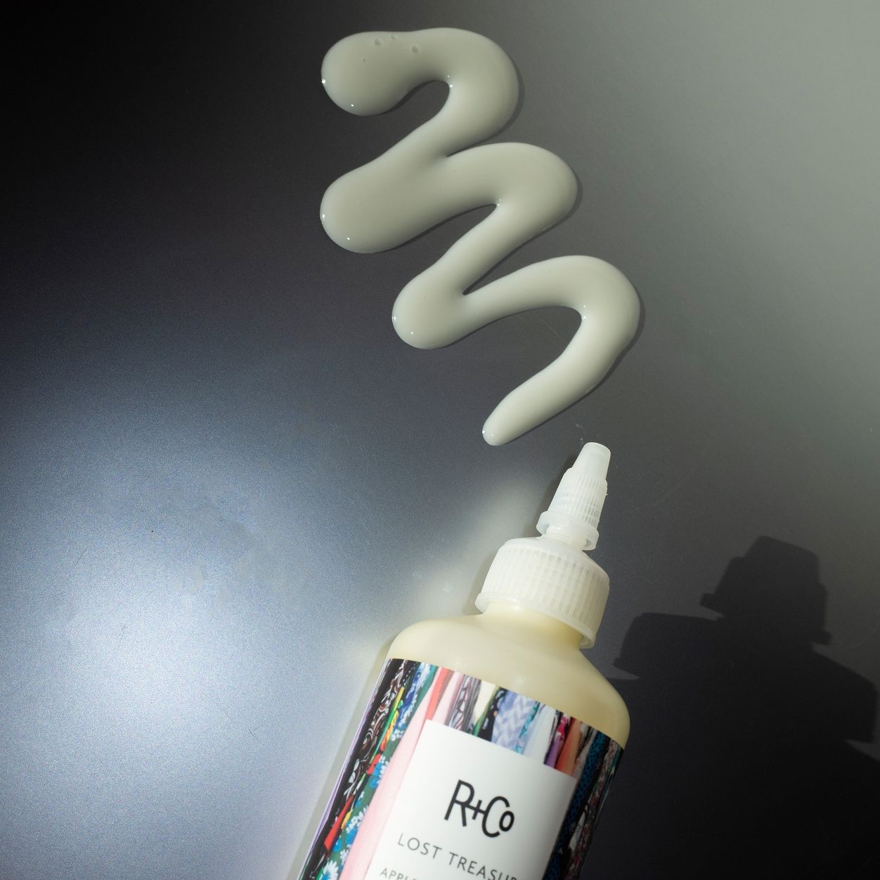 Lifestyle image of R+Co Lost Treasure Apple Cider Vinegar Conditioner