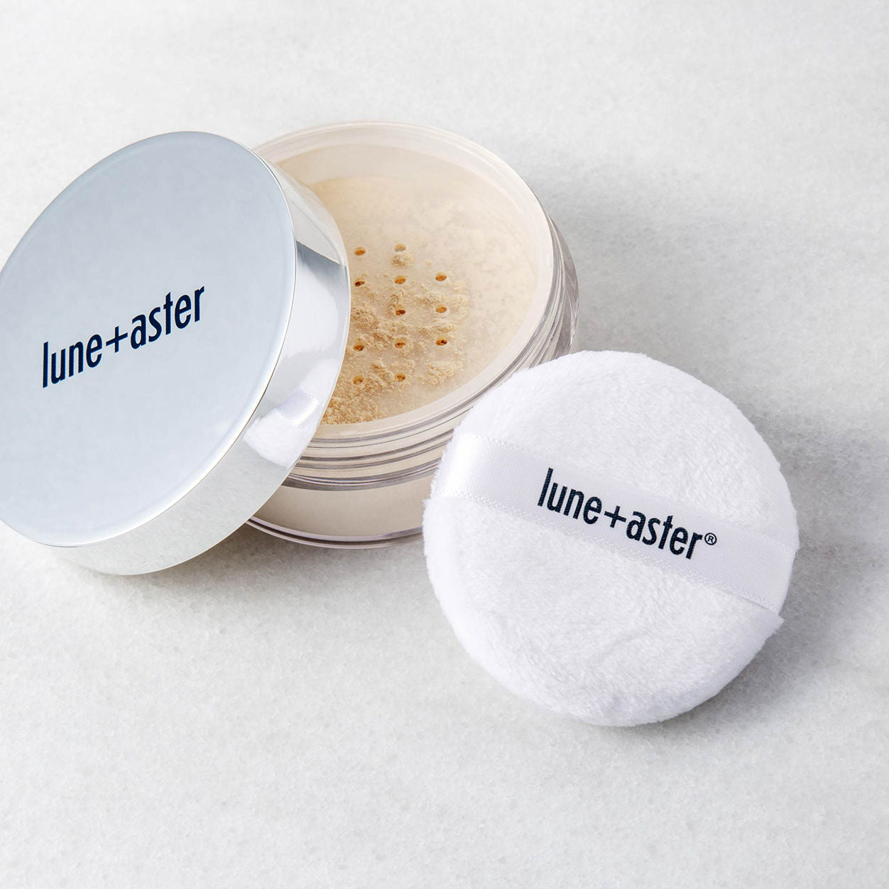 Lifestyle image of Lune+Aster PowerFinish Translucent Loose Powder