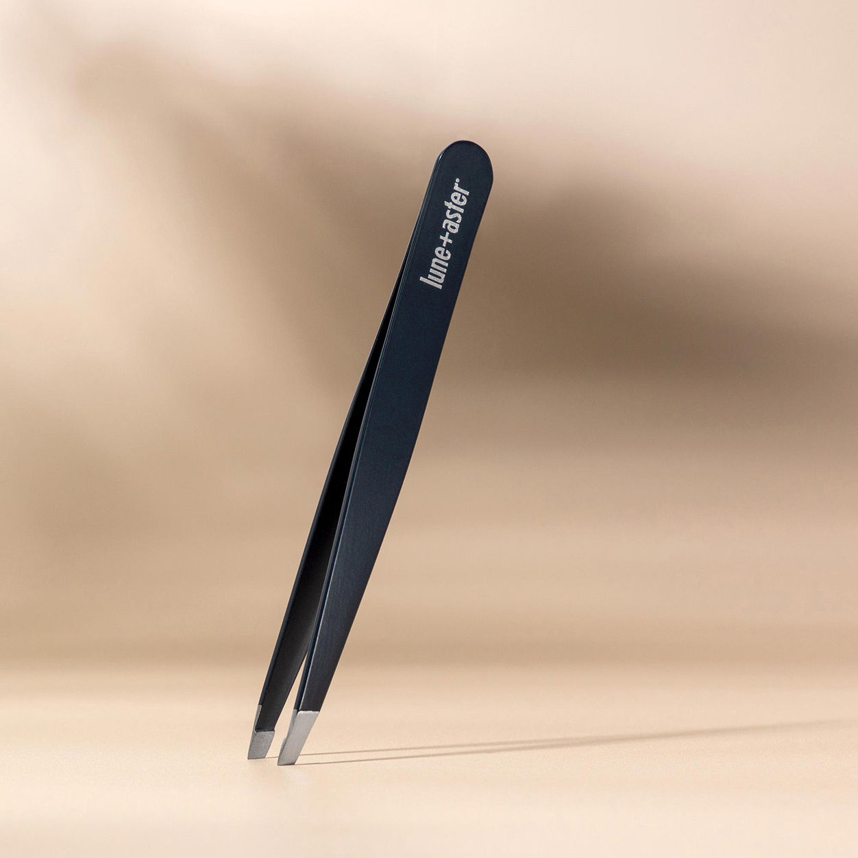 Lifestyle image of Lune+Aster Slant Tweezer