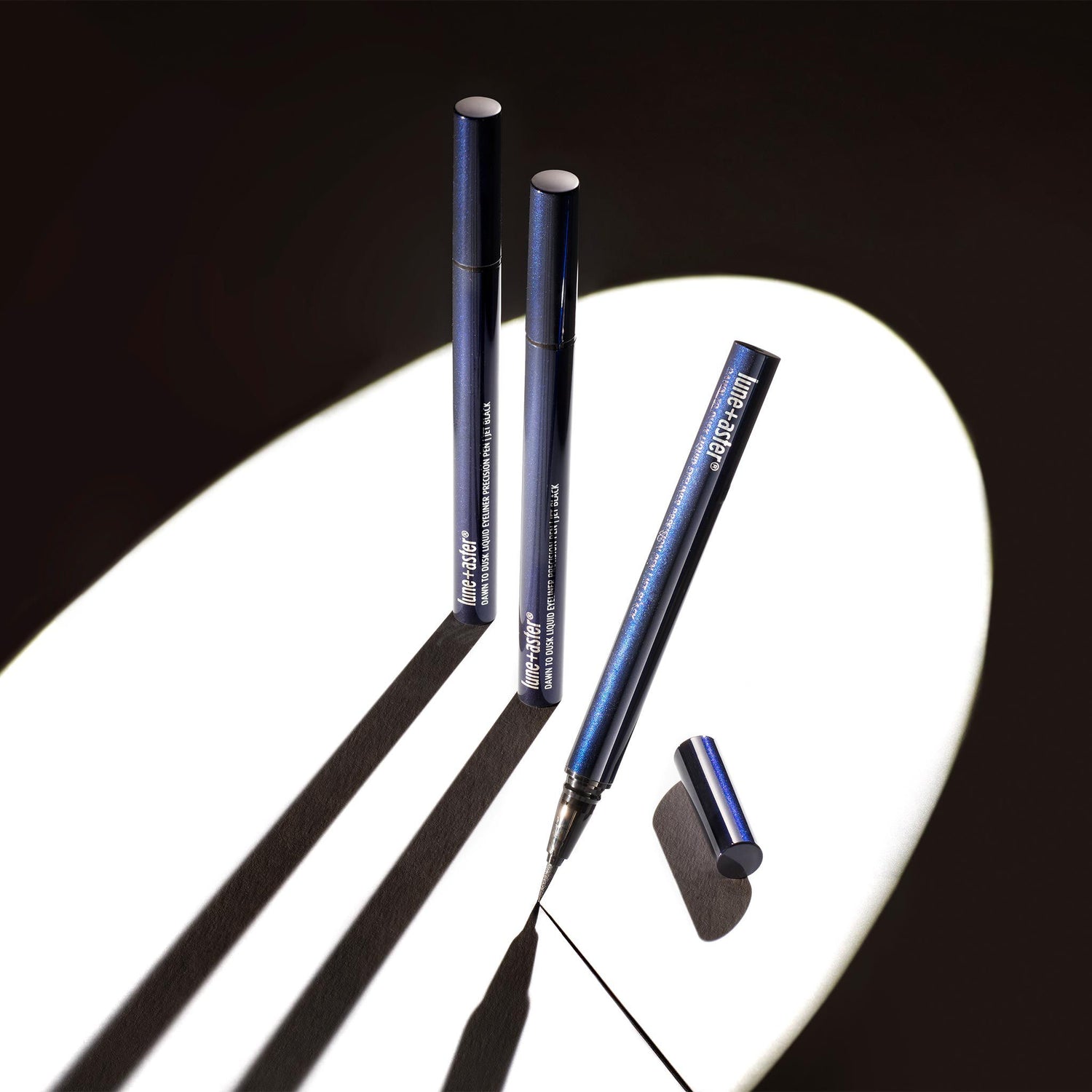 Lifestyle image of Lune+Aster Dawn to Dusk Liquid Eyeliner Precision Pen
