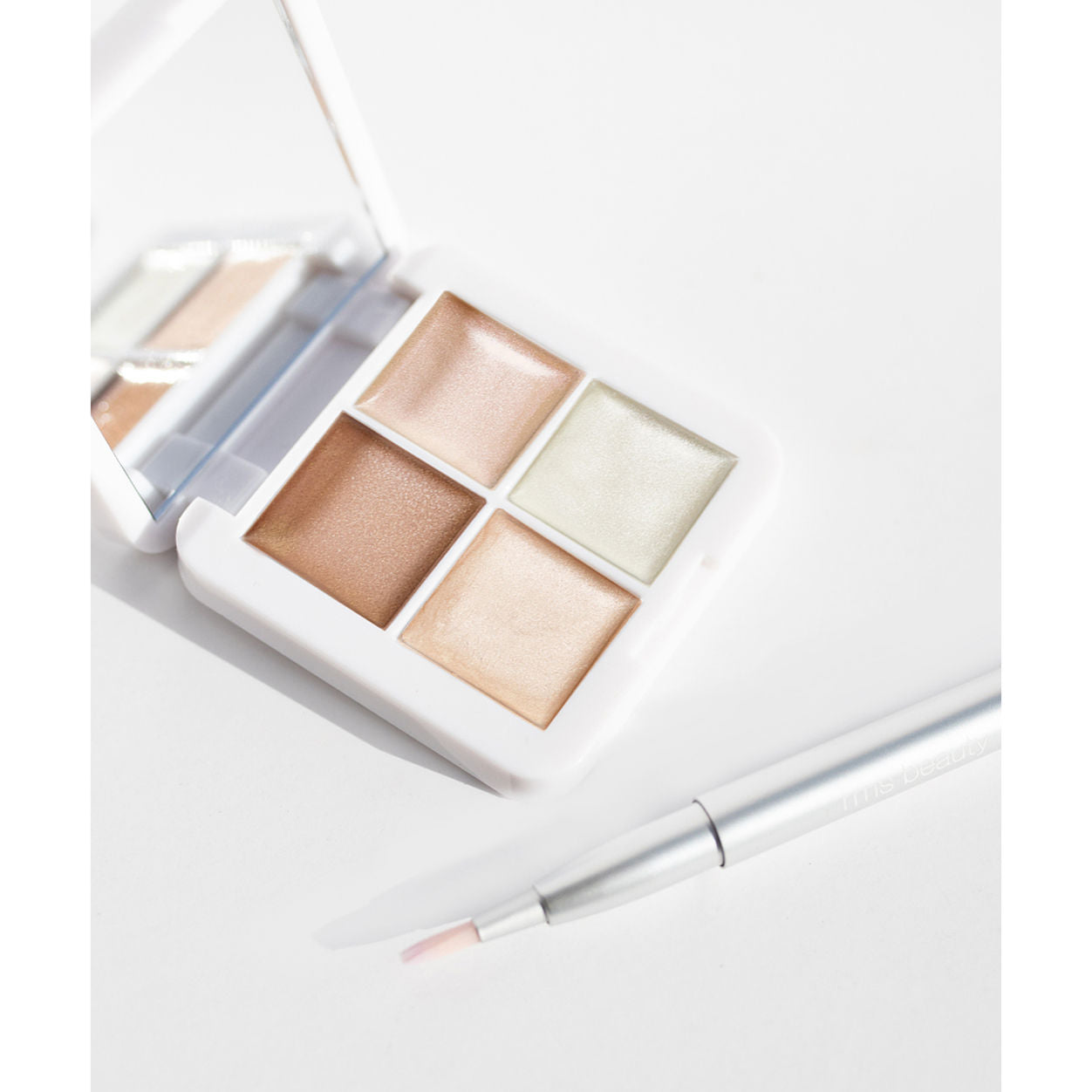 Lifestyle image of RMS Beauty Living Luminizer Glow Quad Mini