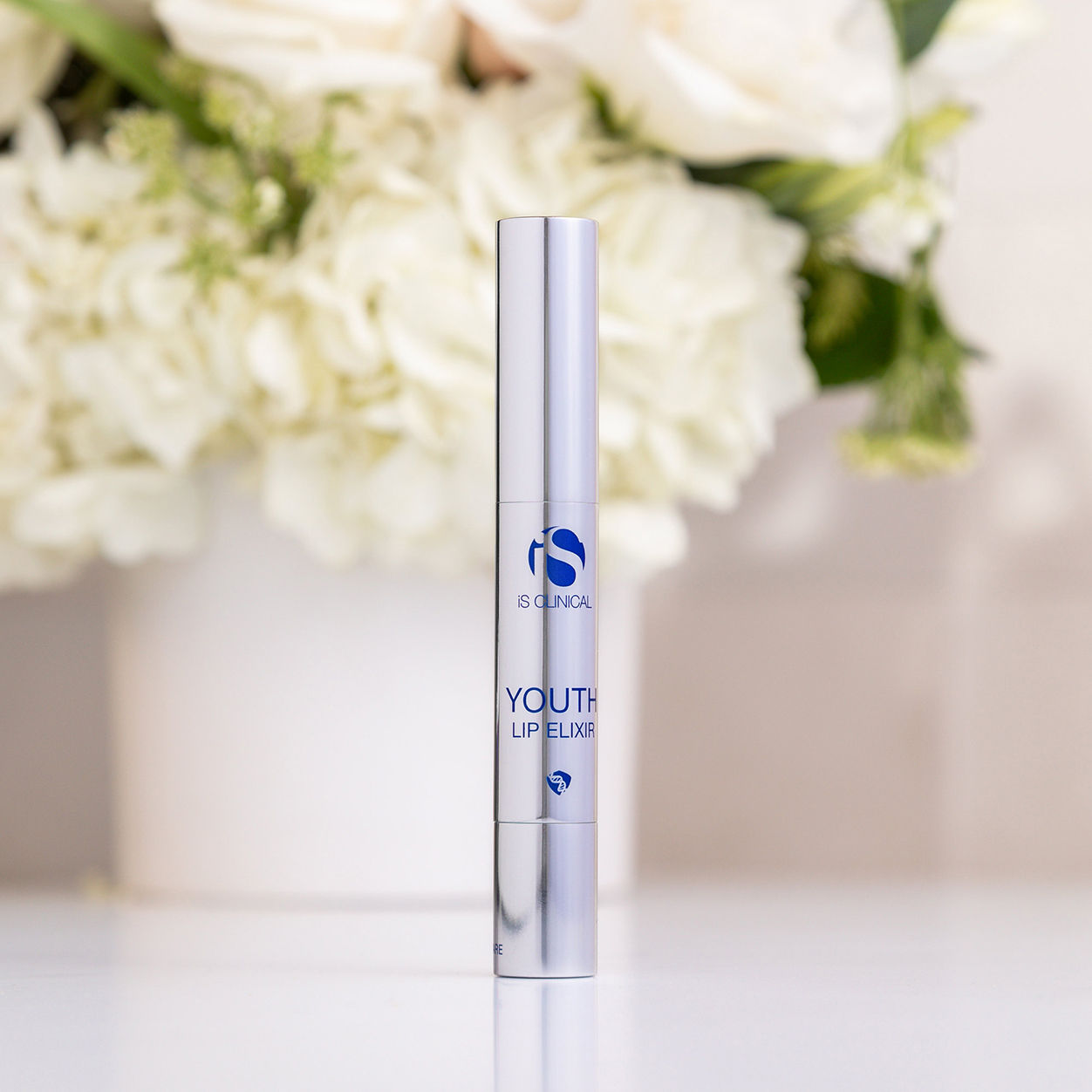 Lifestyle image of IS Clinical Youth Lip Elixir