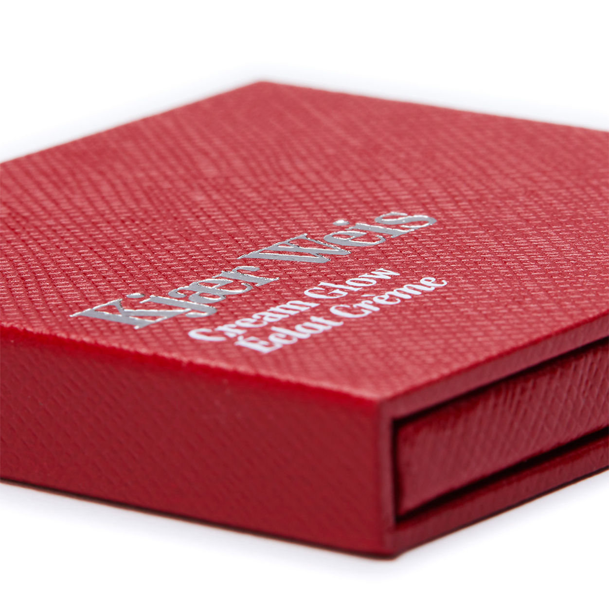 Side image of Kjaer Weis Red Edition Cream Glow Case