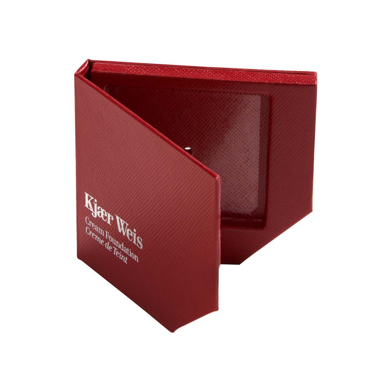 Image of an open Kjaer Weis Red Edition Compact Cream Foundation Case