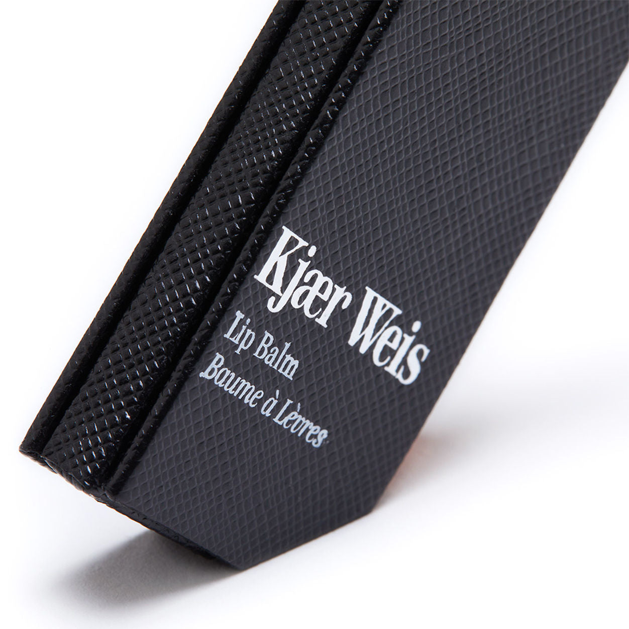 Lifestyle image of Kjaer Weis Black Edition Lip Balm Case