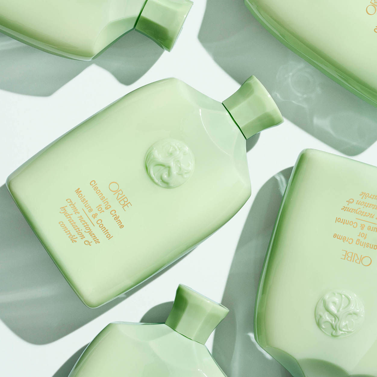 Lifestyle image of Oribe Cleansing Crème For Moisture and Control