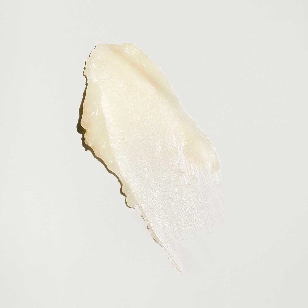 Lifestyle image of Oribe Balmessence Lip Treatment