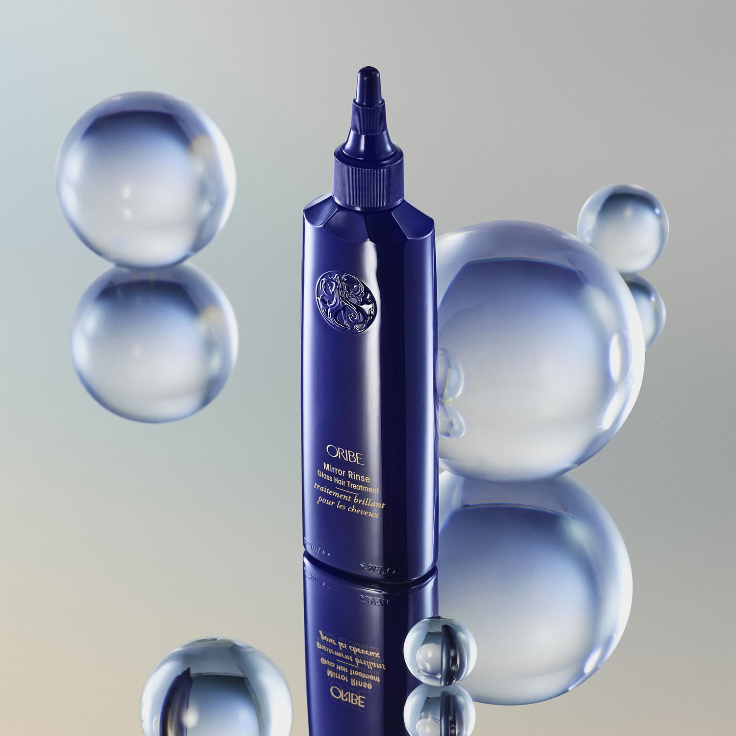 Lifestyle image of Oribe Mirror Rinse Glass Hair Treatment