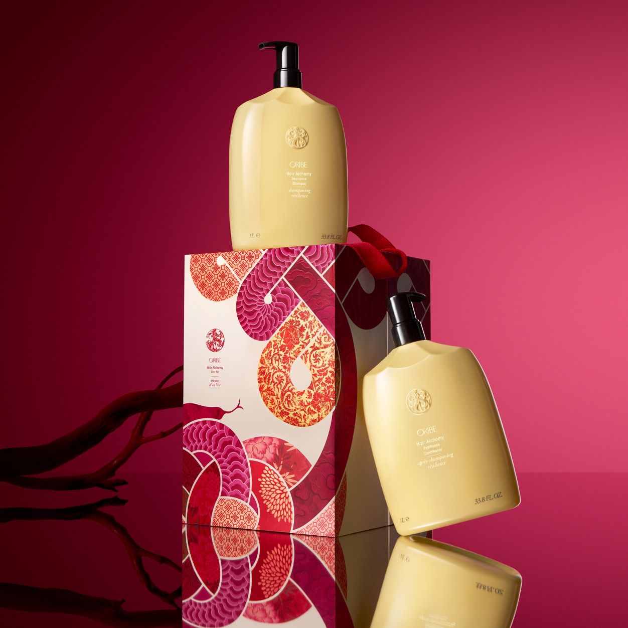 Lifestyle image of Oribe Lunar New Year Hair Alchemy Liter Set (Limited Edition)
