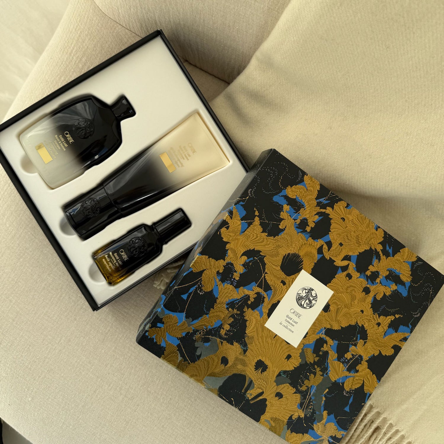 Image of an open Oribe Gold Lust Collection Gift Set (Limited Edition)