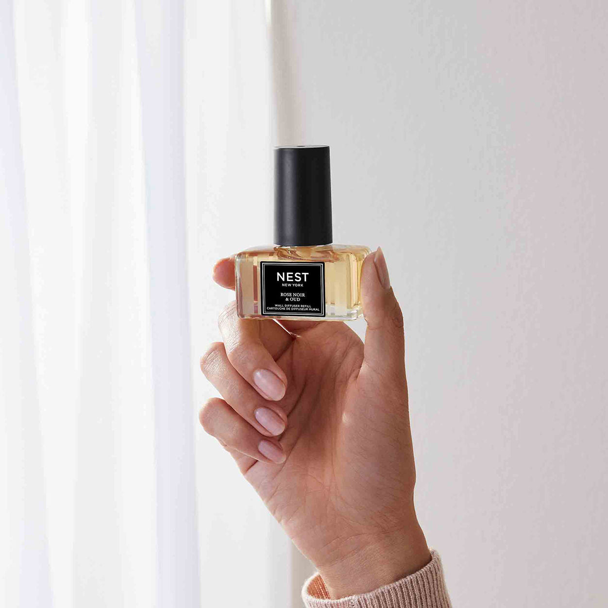 Model image of Nest Rose Noir and Oud Wall Diffuser Refill