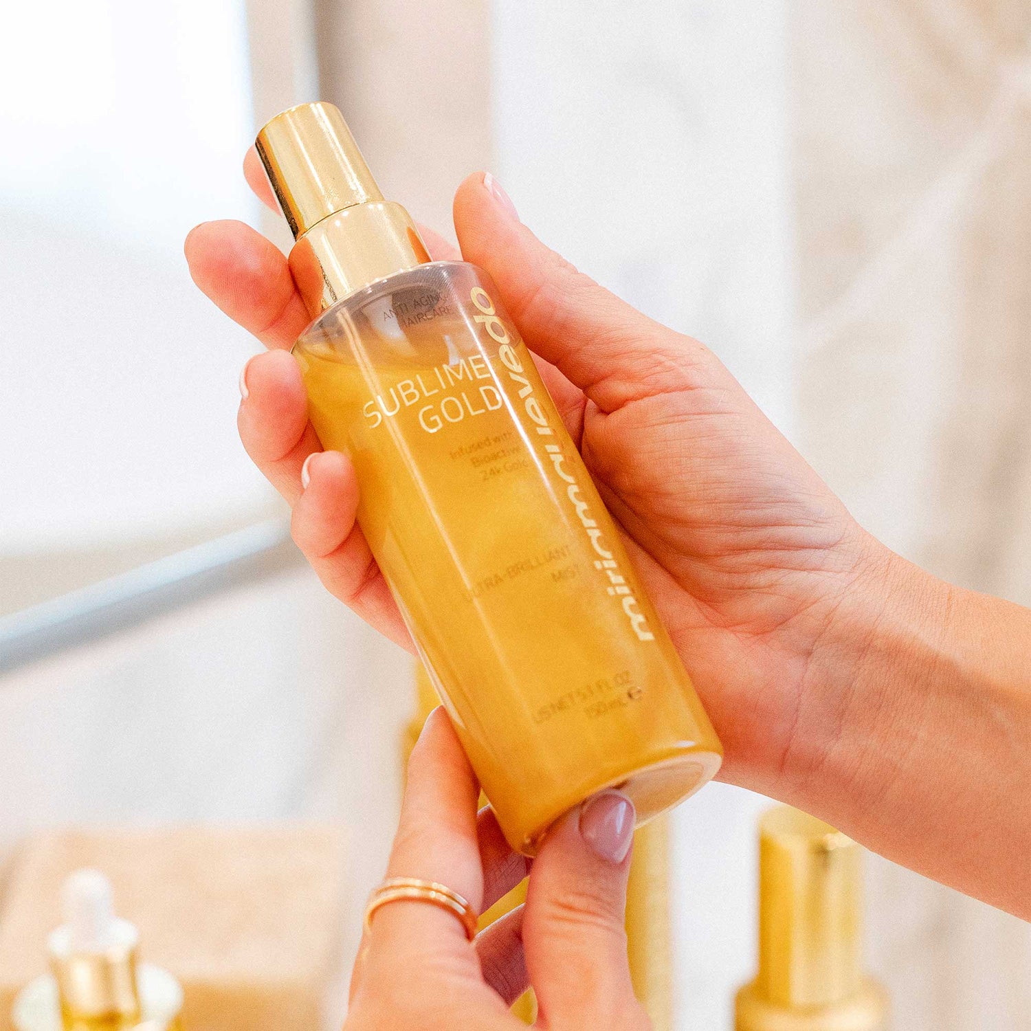 Lifestyle image of Miriam Quevedo Sublime Gold Ultra Brilliant Mist