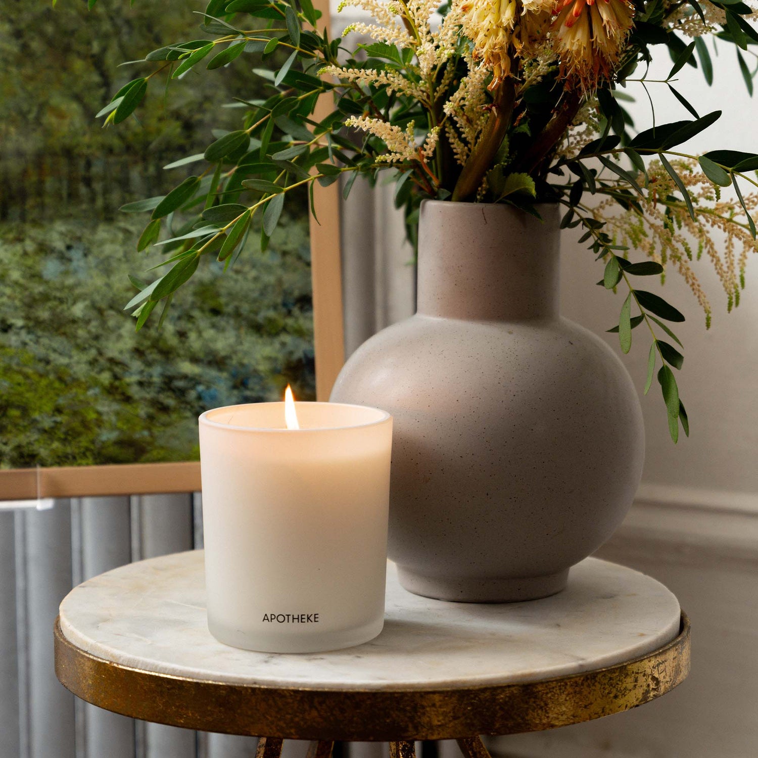 Lifestyle image of Apotheke White Vetiver Classic Scented Candle