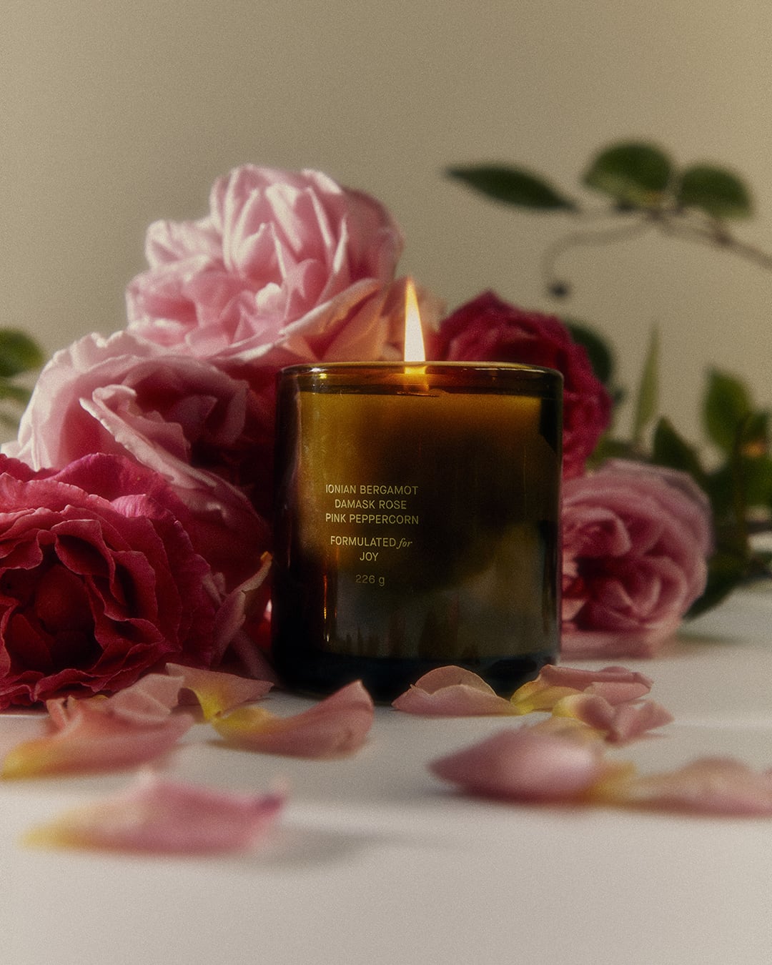 Lifestyle image of Flamingo Estate Night Blooming Jasmine & Damask Rose Candle