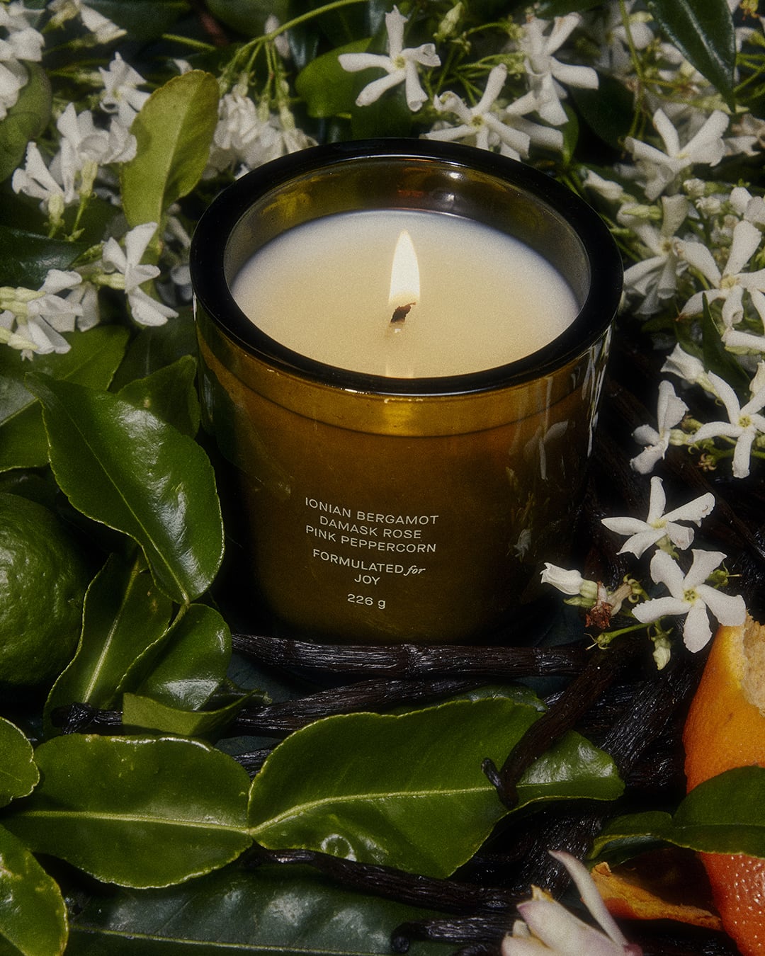 Lifestyle image of Flamingo Estate Night Blooming Jasmine & Damask Rose Candle