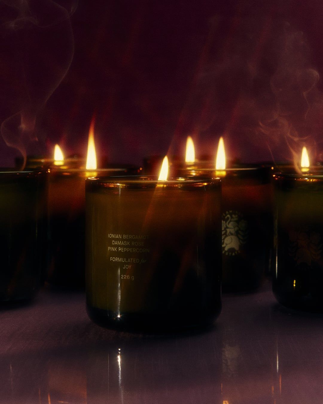 Lifestyle image of Flamingo Estate Night Blooming Jasmine & Damask Rose Candle