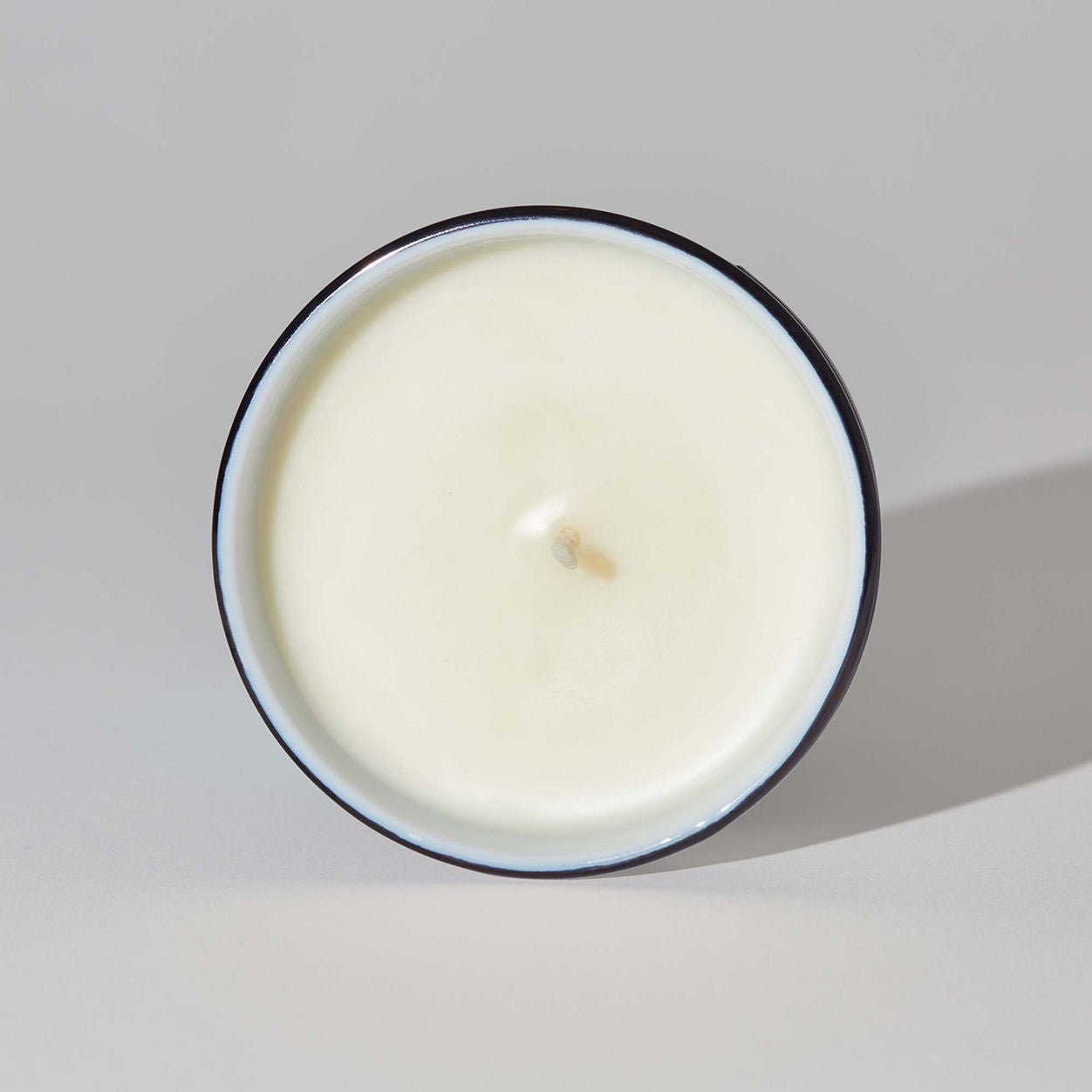 Lifestyle image of Nette Suede Fringe Candle