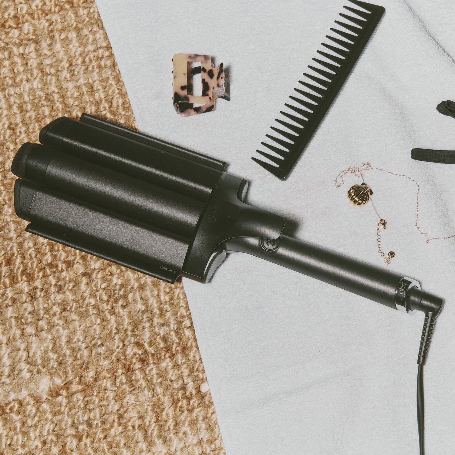 Image of a closed GHD Wave Triple Barrel Waver