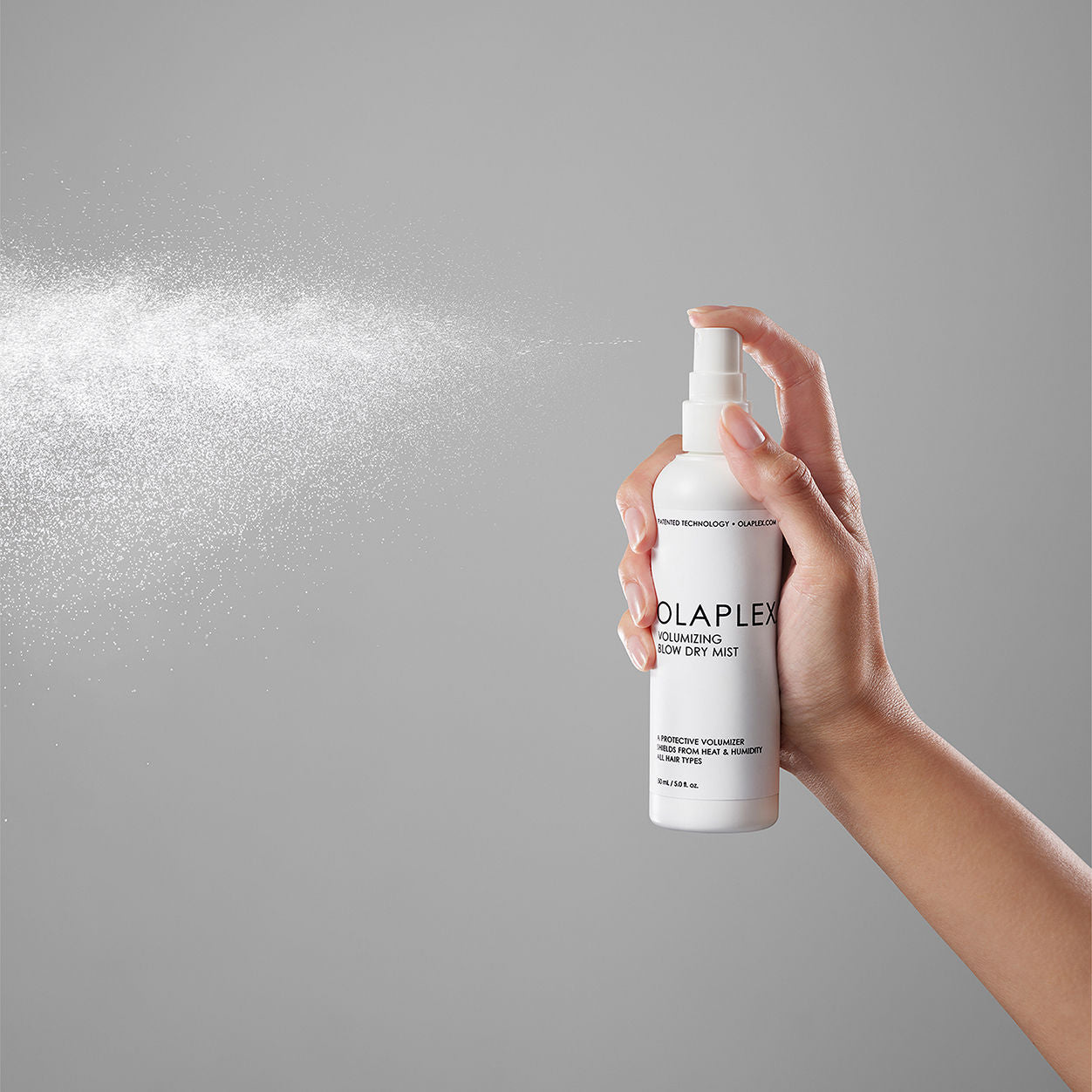 Lifestyle image of Olaplex Volumizing Hair Heat Protective Weightless Blowout Mist
