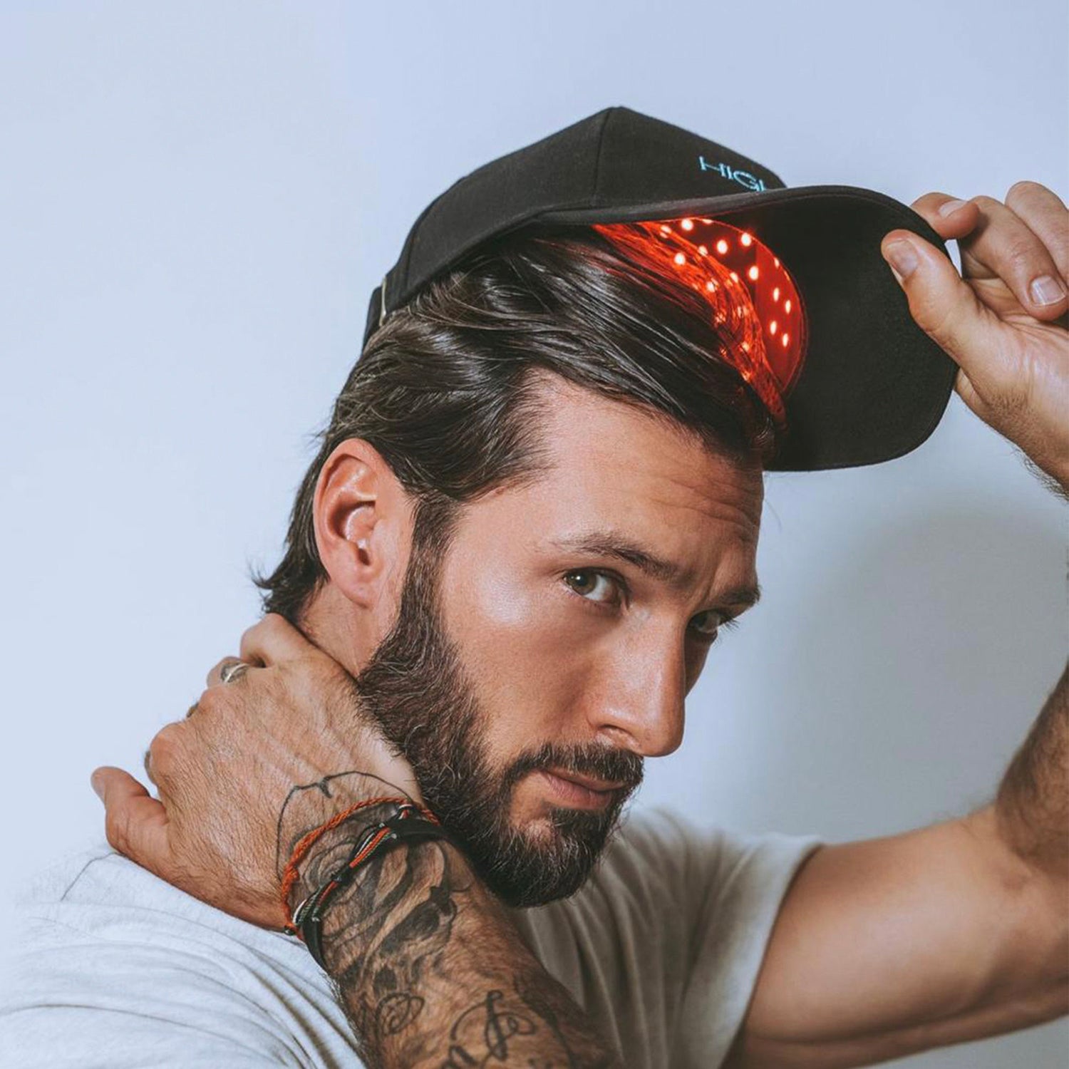 Lifestyle image of HigherDose Red Light Hat