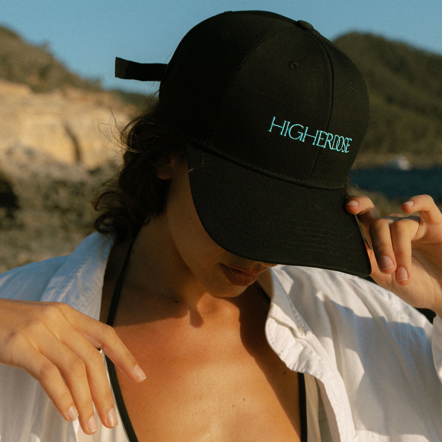 Lifestyle image of HigherDose Red Light Hat