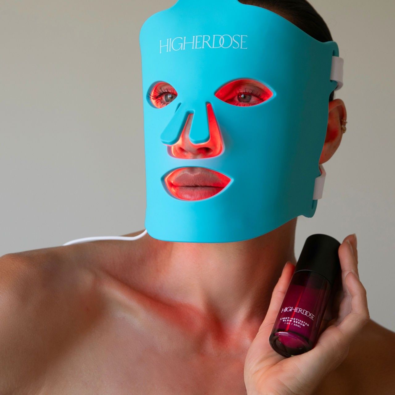 Lifestyle image of HigherDose Red Light Face Mask