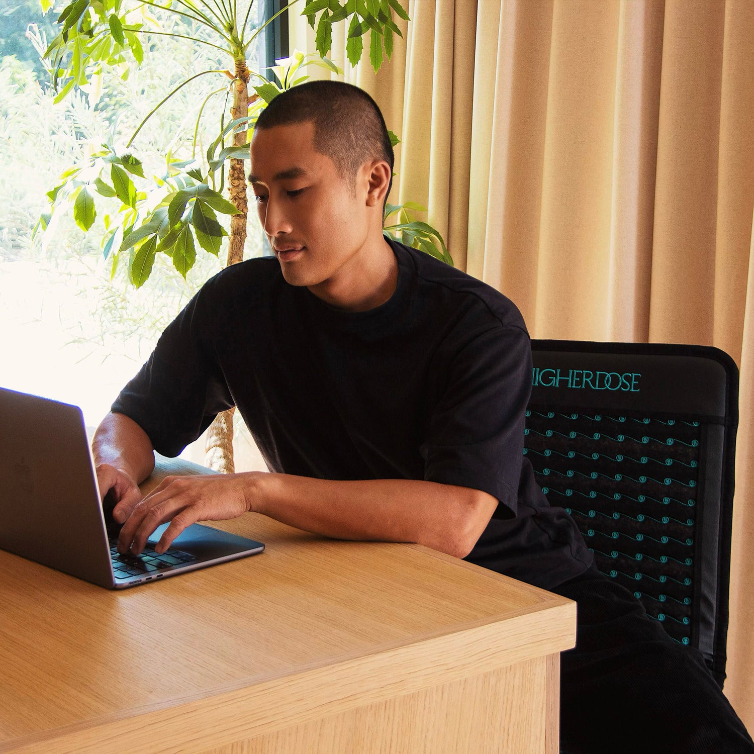 Lifestyle image of HigherDose Infrared PEMF Go Mat