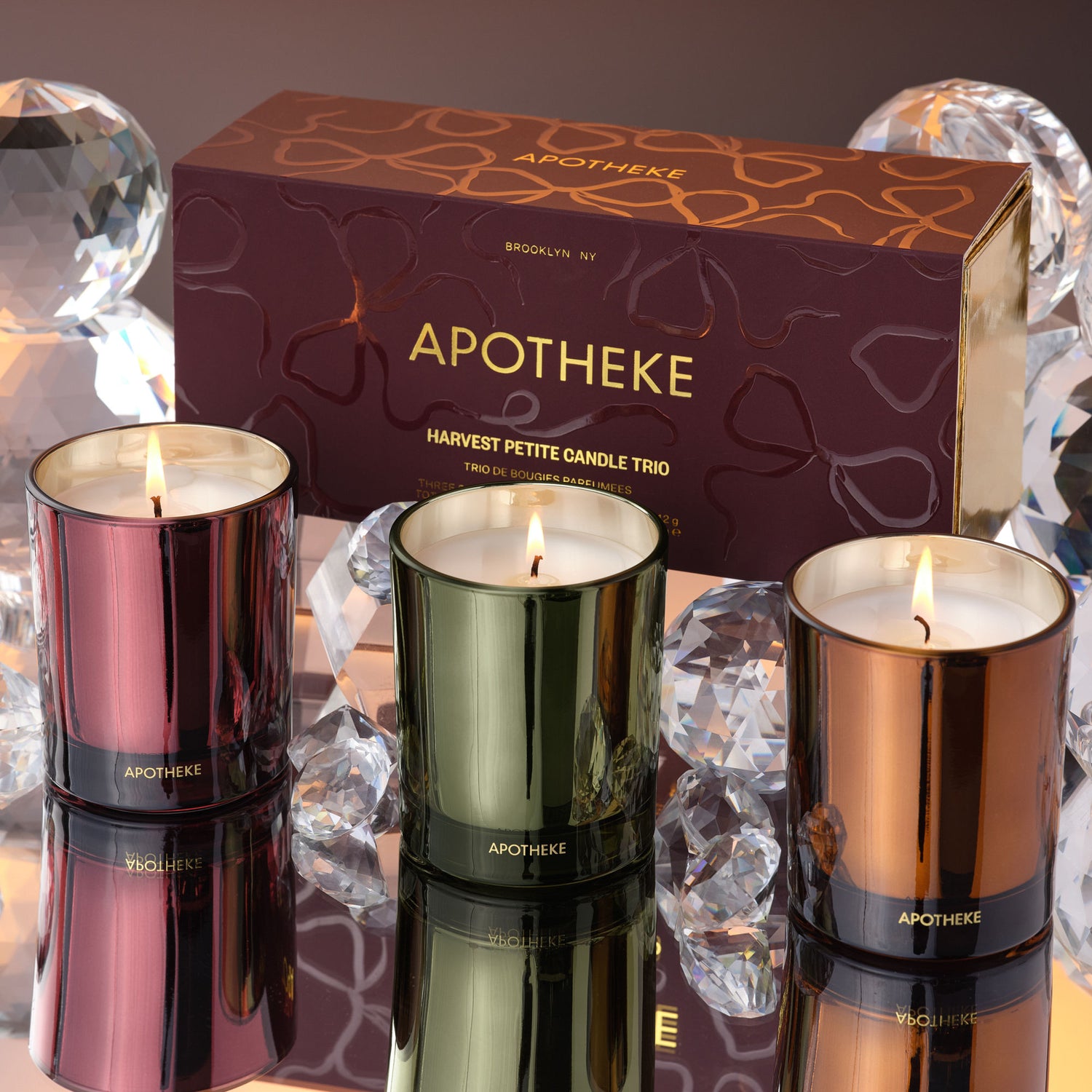 Lifestyle image of Apotheke Harvest Petite Scented Candle Trio (Limited Edition)