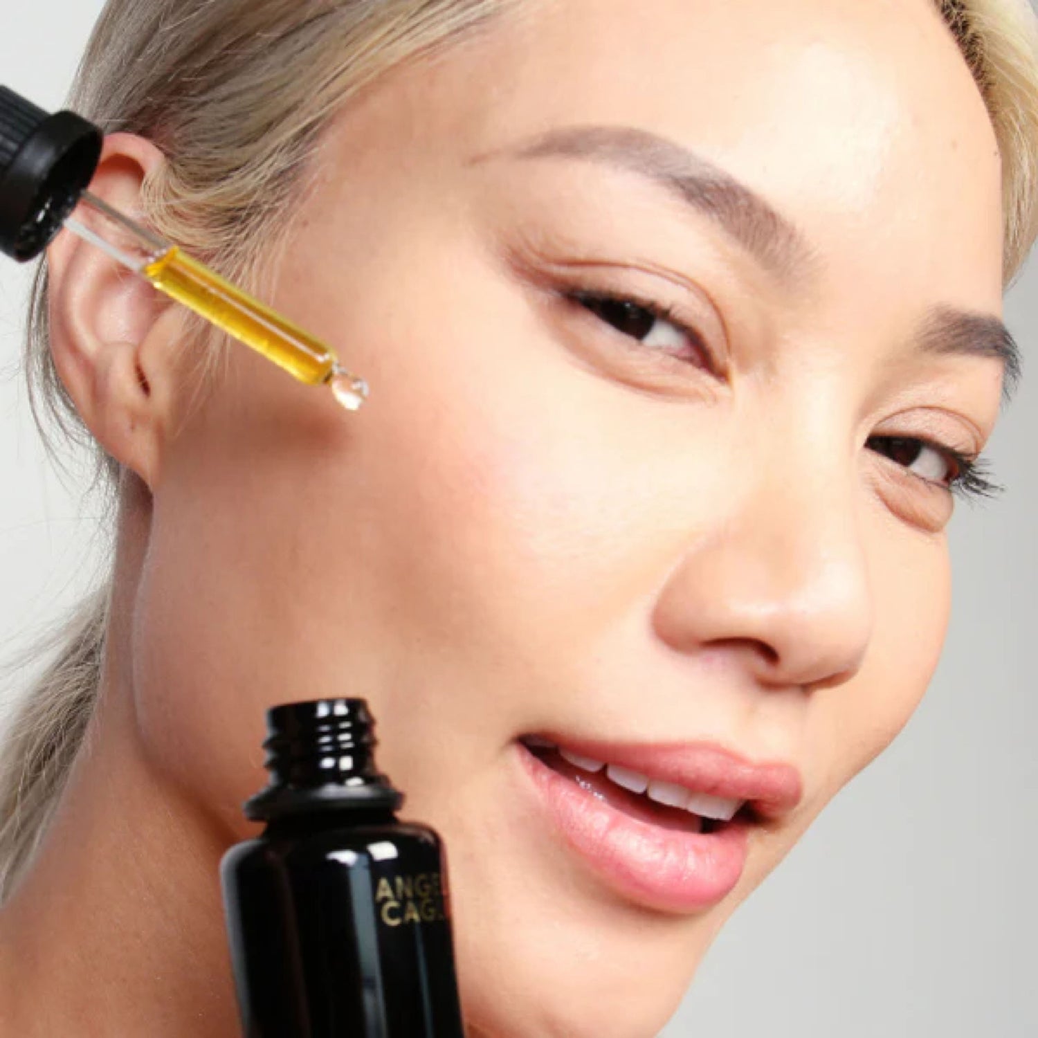 Model image of Angela Caglia Skincare Daily Botanical Oil