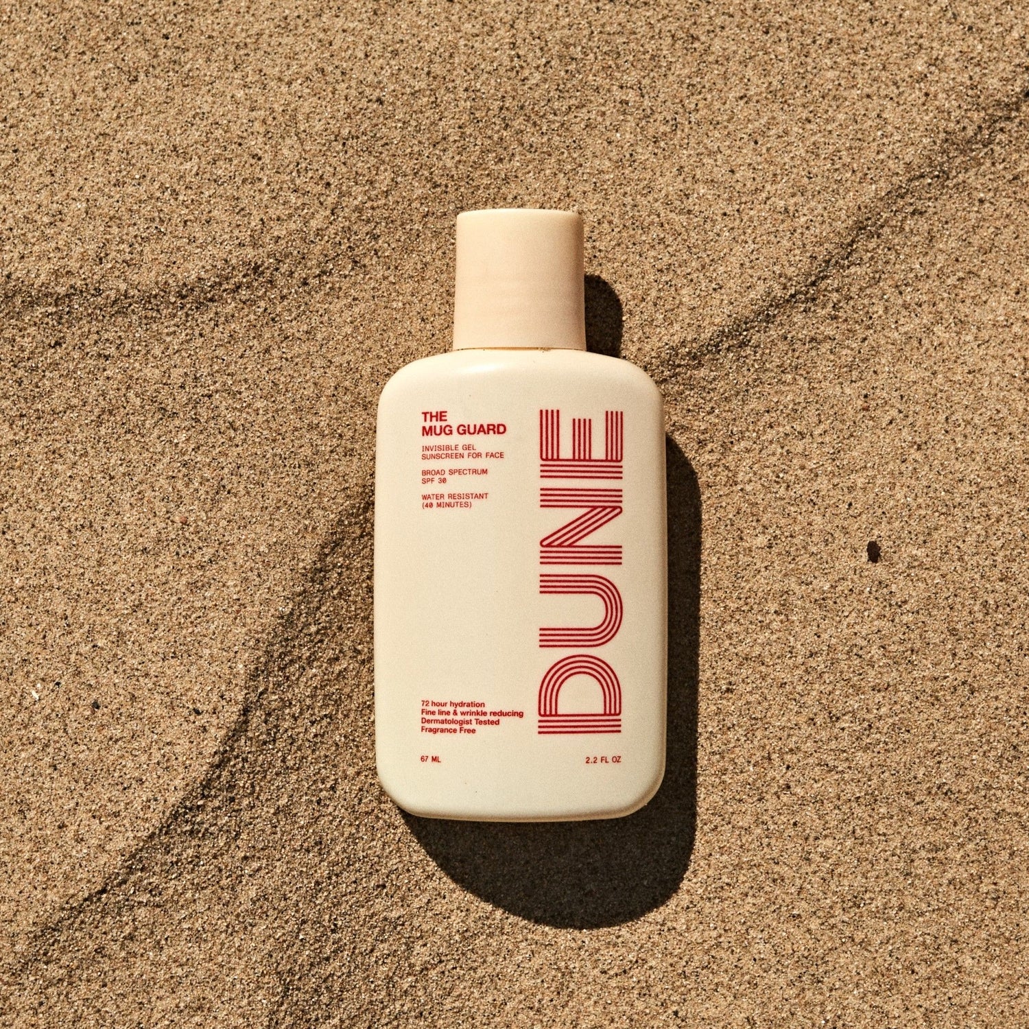 Lifestyle image of Dune The Mug Guard SPF 30