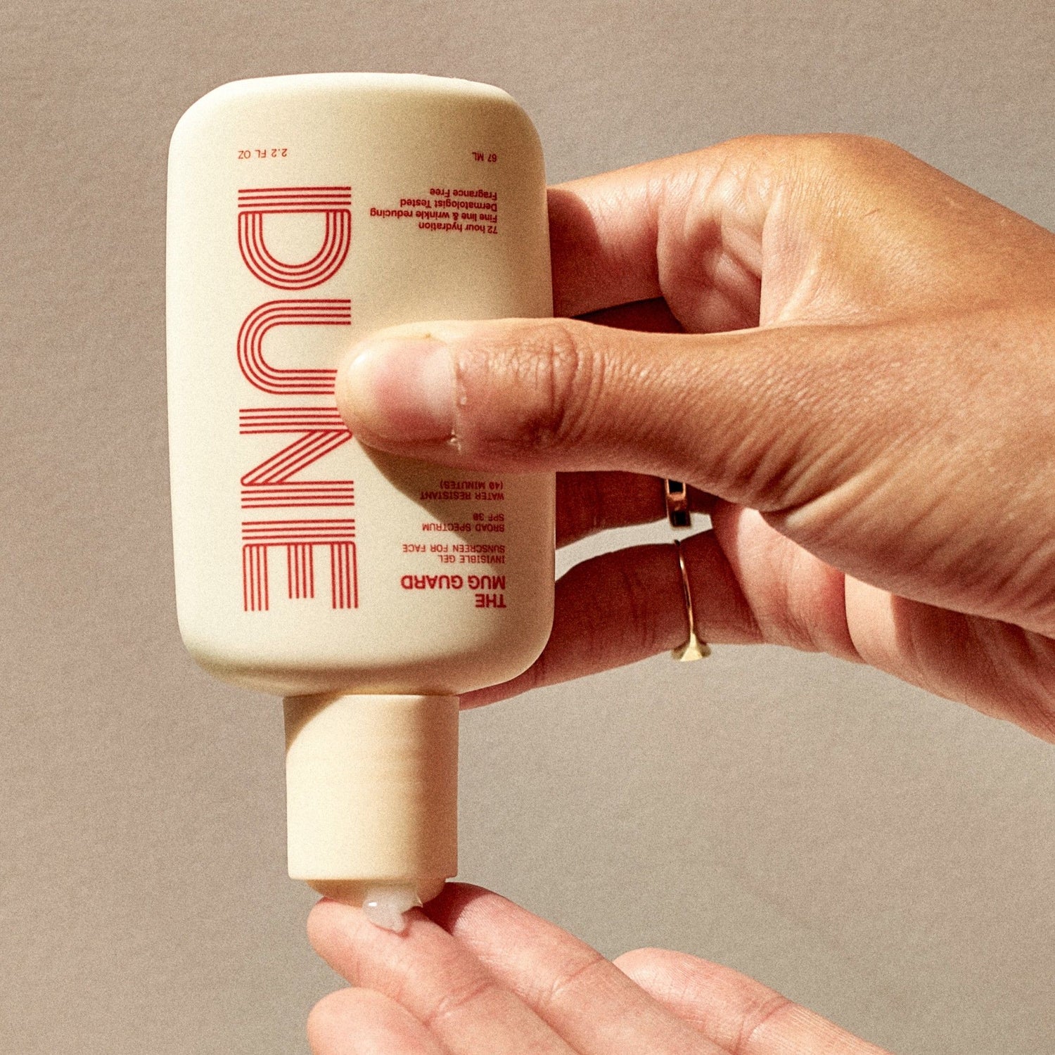 Lifestyle image of Dune The Mug Guard SPF 30
