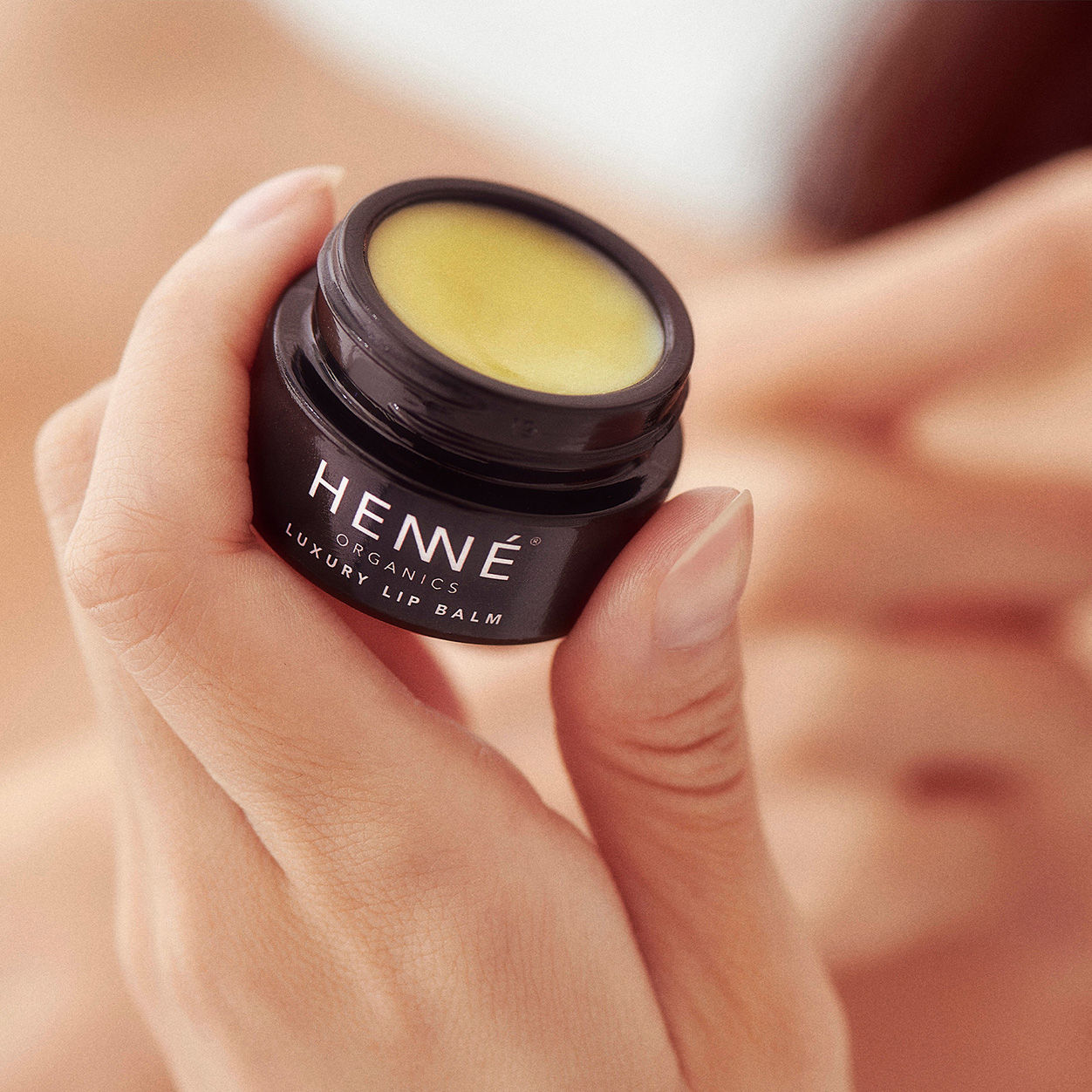 Lifestyle image of Henne Organics Luxury Lip Balm