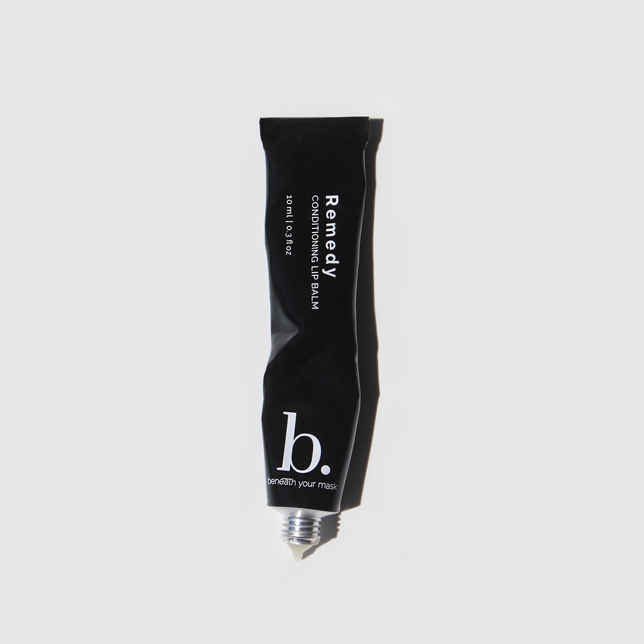 Lifestyle image of Beneath Your Mask Remedy Conditioning Lip Balm