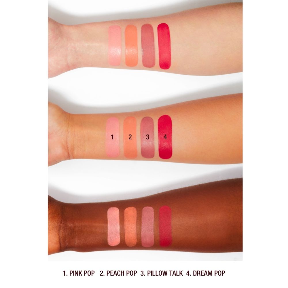 An arm swatch of Charlotte Tilbury Matte Beauty Blush Wand variant: Pillow Talk Pink Pop