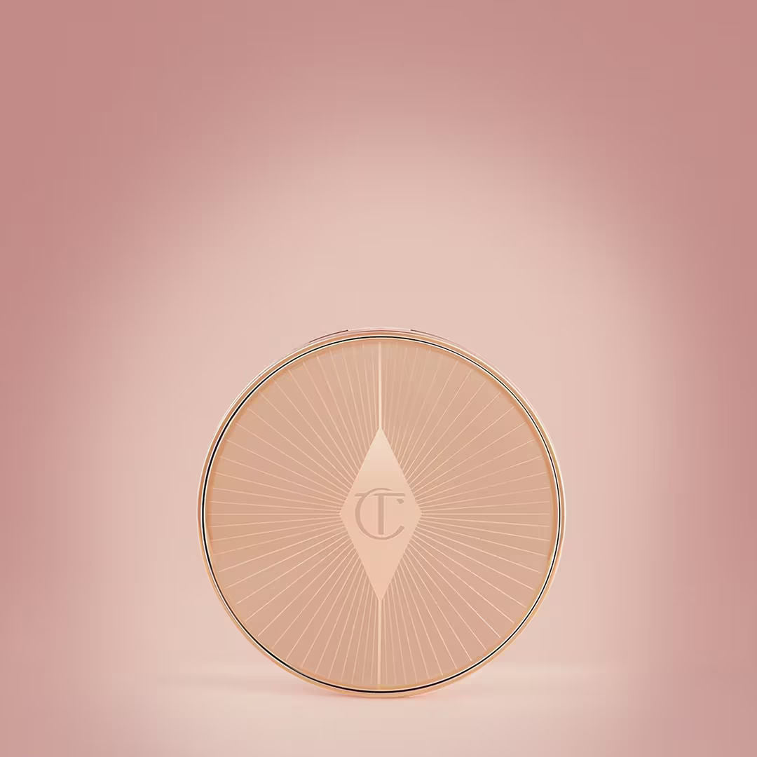 Image of a closed Charlotte Tilbury Paradise Pink Glow variant: Paradise Pink Glow