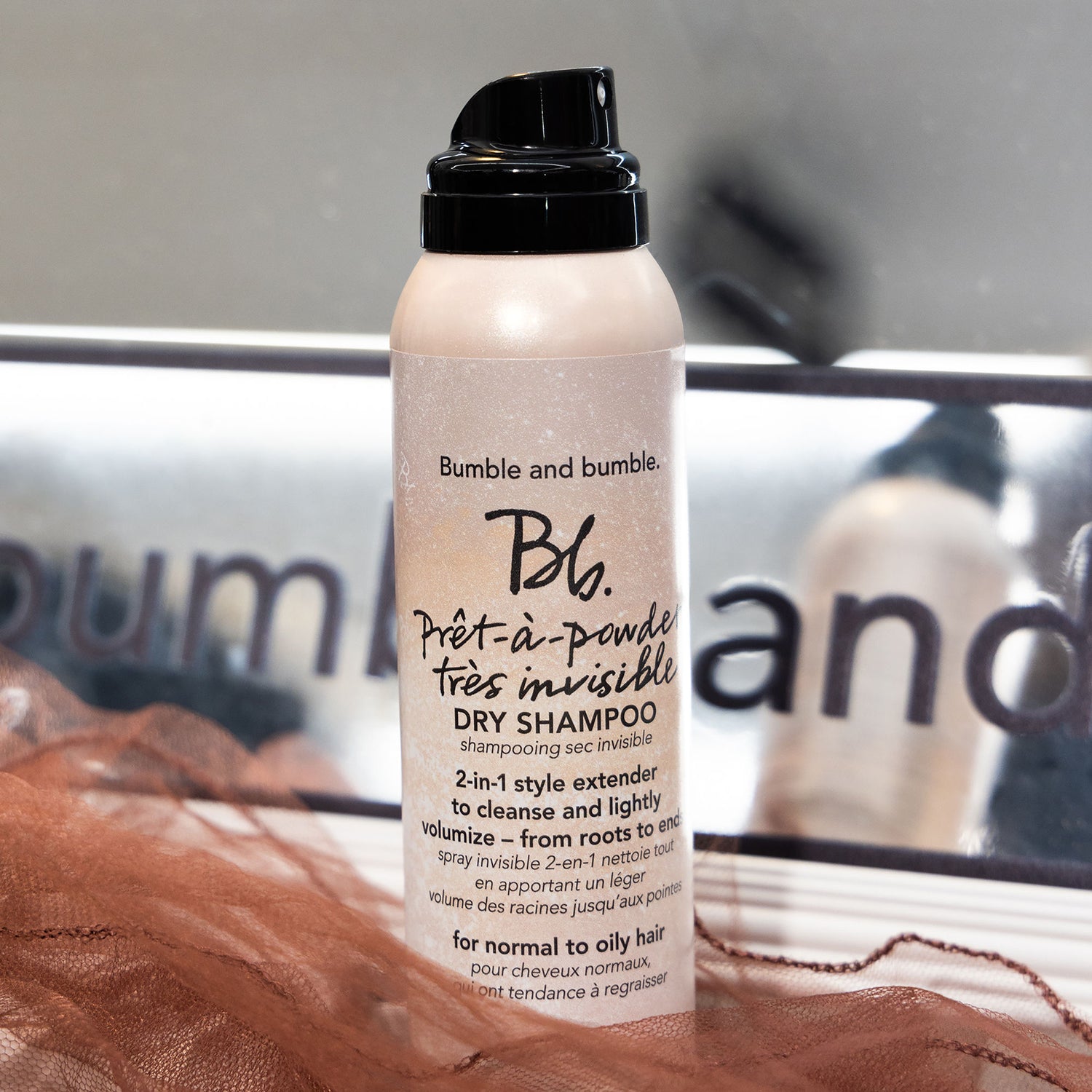 Lifestyle image of Bumble and Bumble Prêt-à-Powder Très Invisible Dry Shampoo variant: 3.1 oz