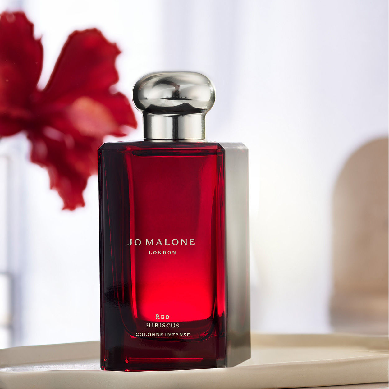 Lifestyle image of Jo Malone London Red Hibiscus Cologne Intense variant: 1.7 fl oz