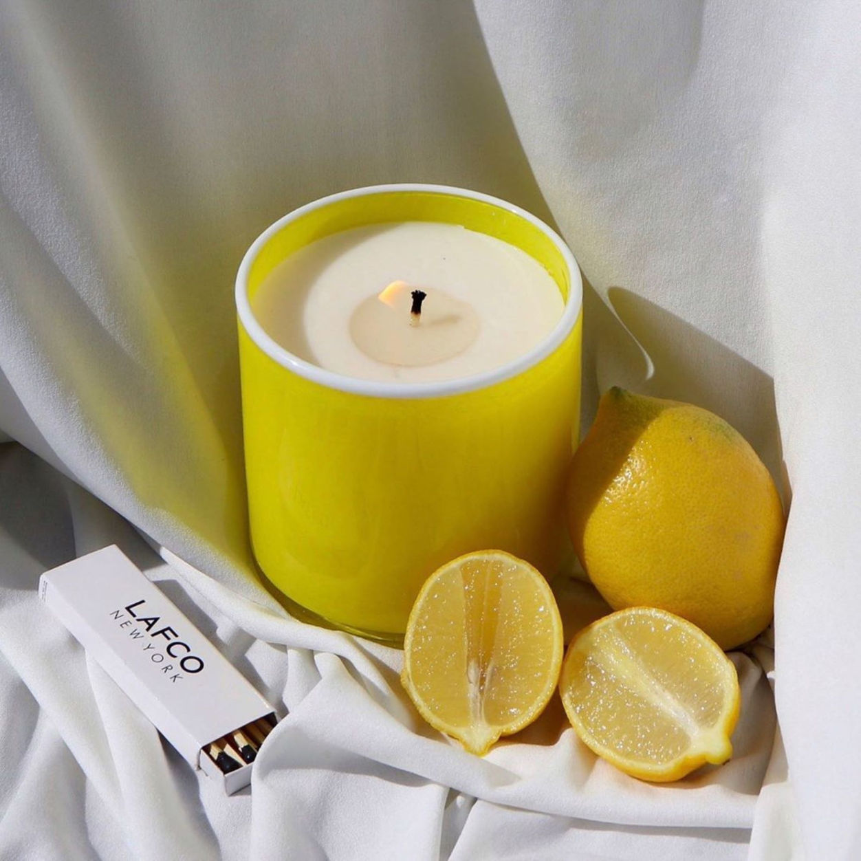 Lifestyle image of Lafco White Grapefruit Candle variant: 15.5 oz (Signature)