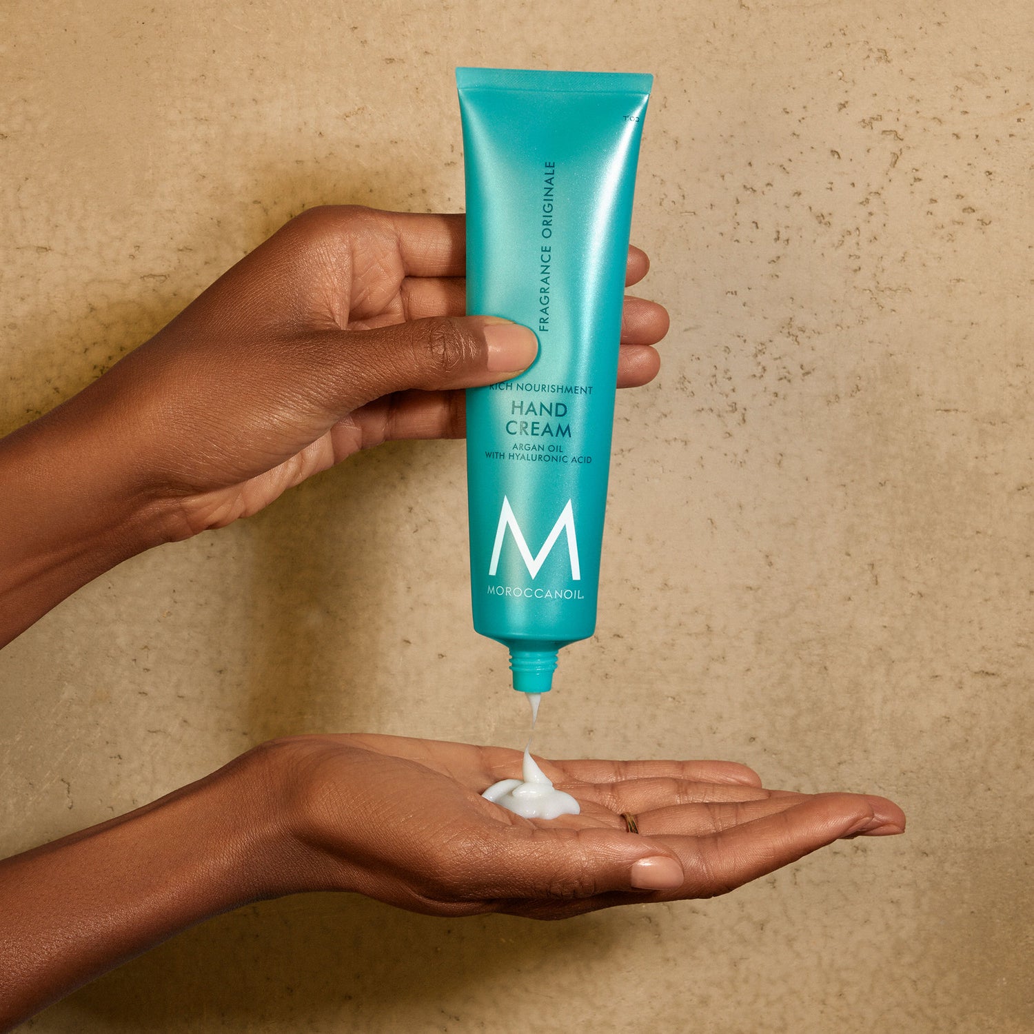 Lifestyle image of Moroccanoil Hand Cream Fragrance Originale variant: 3.4 fl oz