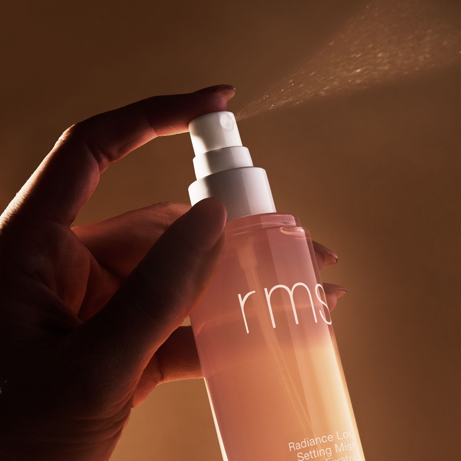Lifestyle image of RMS Beauty Radiance Lock Setting Mist variant: 3.4 fl oz