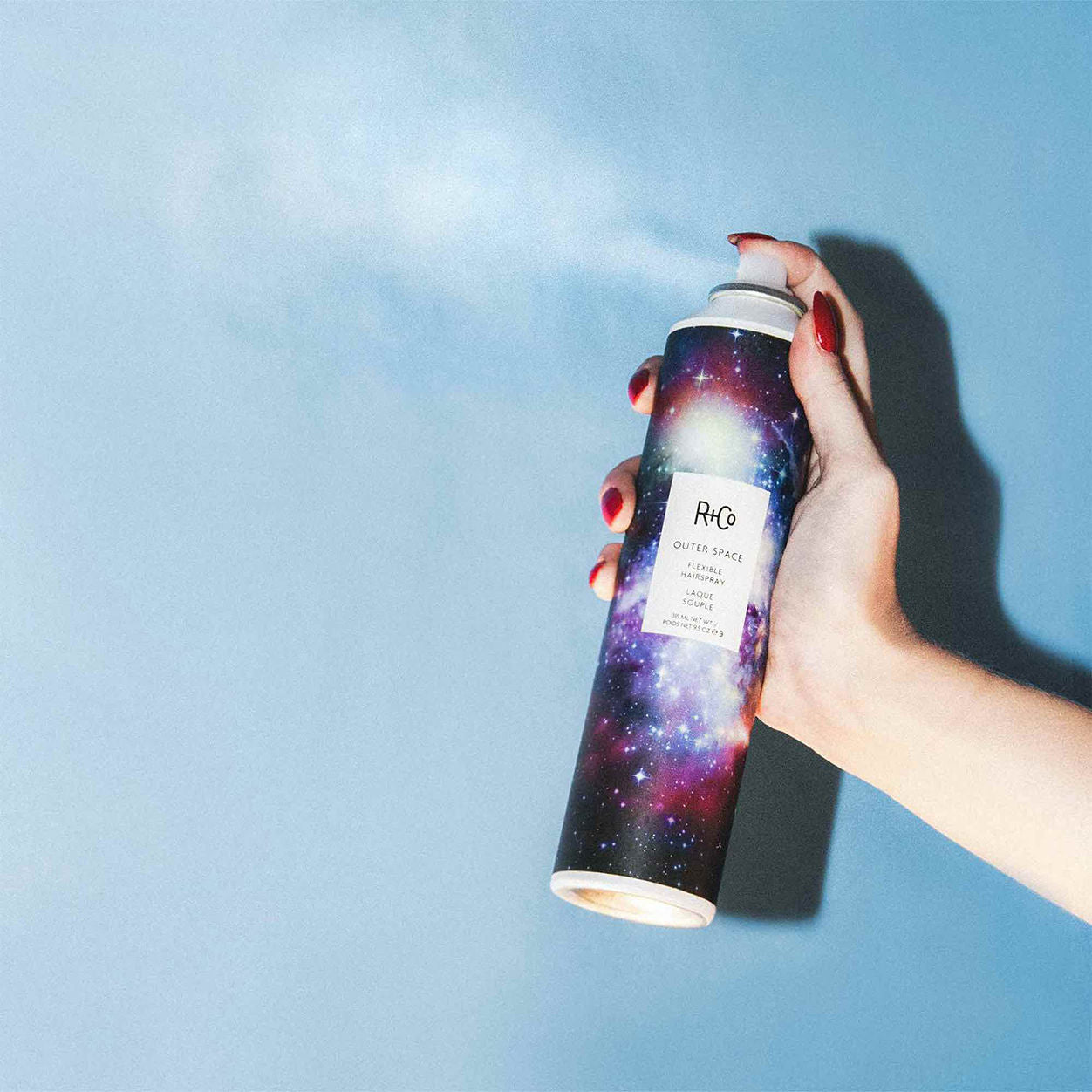 Lifestyle image of R+Co Outer Space Flexible Hairspray variant: 9.5 fl oz
