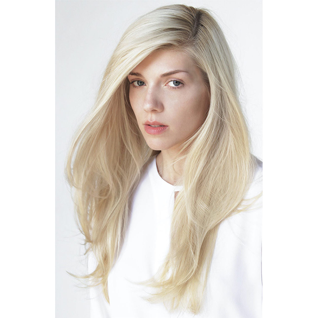 Model image of R+Co Sunset Blvd Blonde Shampoo variant: 8.5 oz