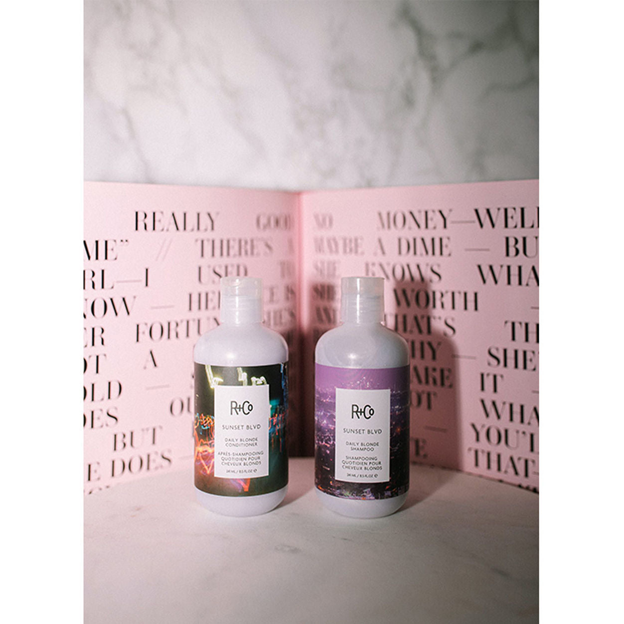 Lifestyle image of R+Co Sunset Blvd Blonde Shampoo variant: 8.5 fl oz