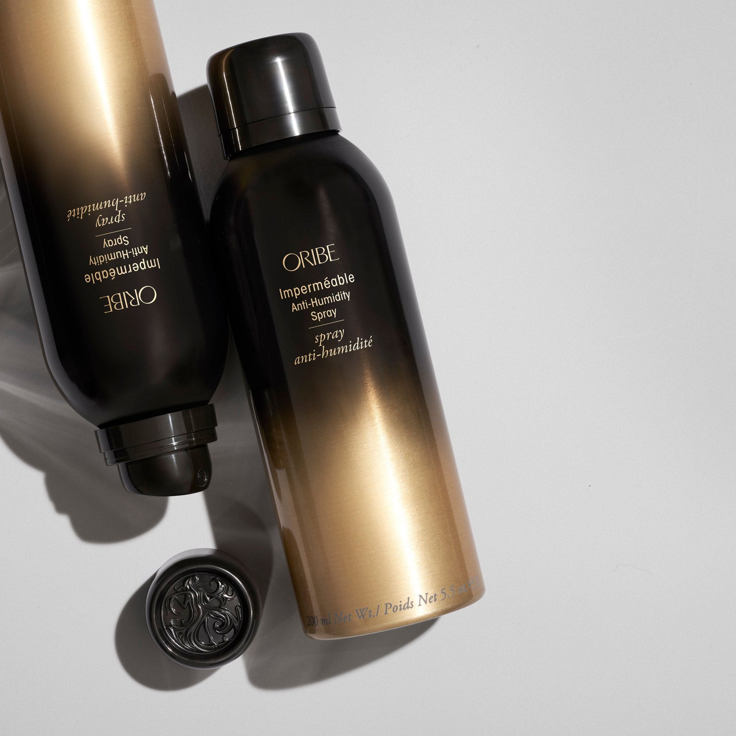 Lifestyle image of Oribe Impermeable Anti-Humidity Spray variant: 5.5 oz
